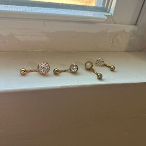 Elegant Gold bellybutton piercings